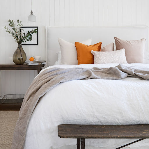 bedroom featuring natural cushion style